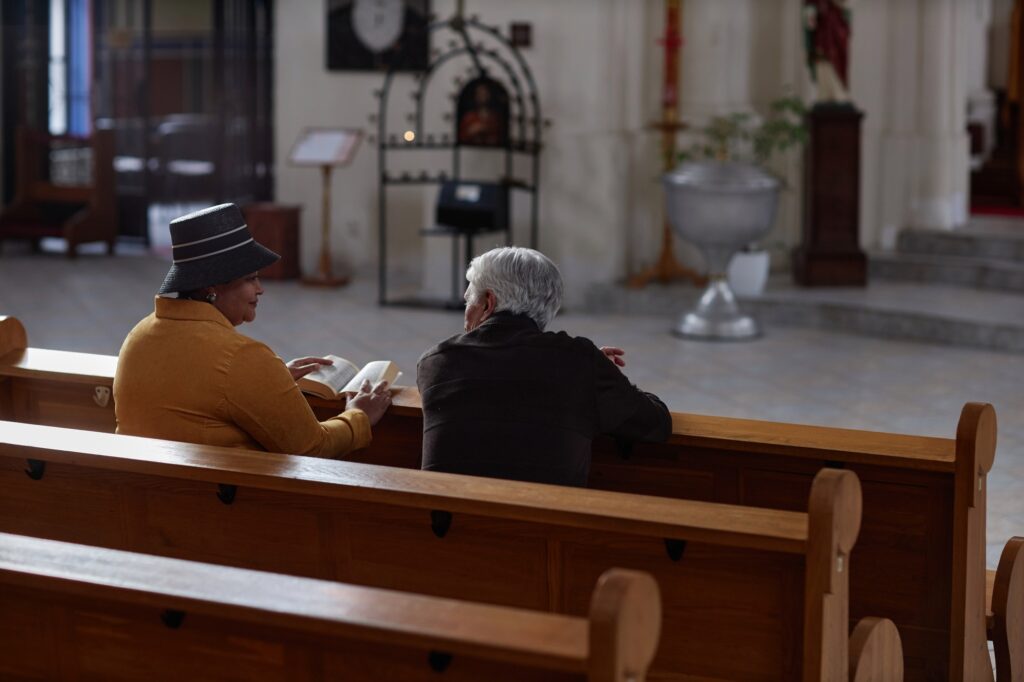 Senior people sitting in church during ministration